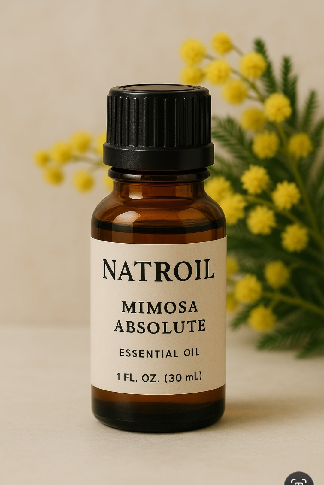 Mimosa essential oil bottle